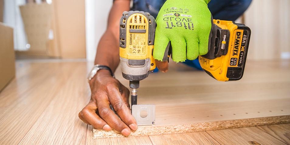 Man drilling into wood