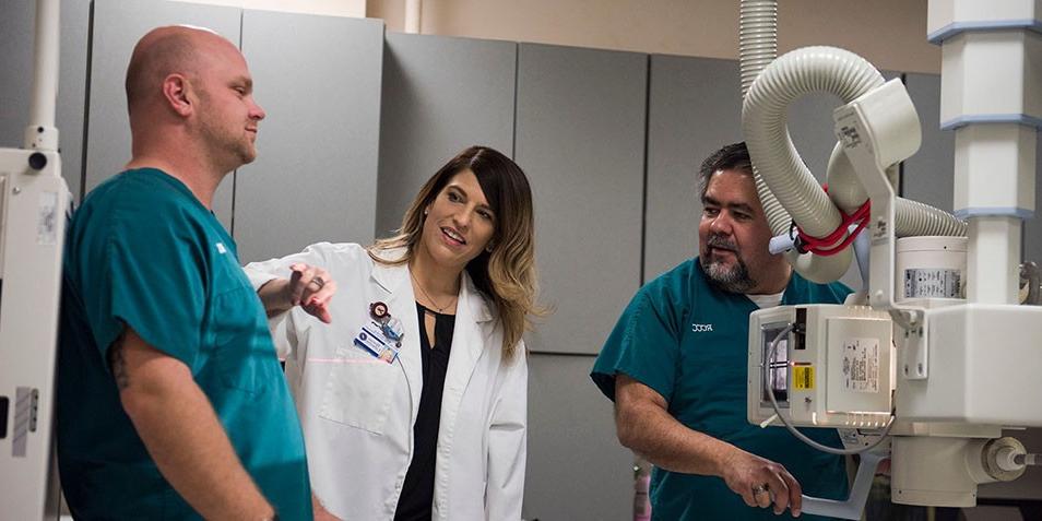 Program chair teaching students how to Xray