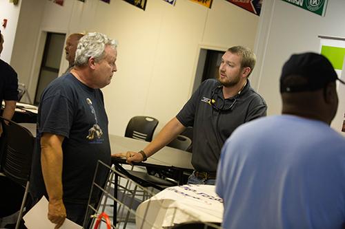 Student talking with employer at internship fair