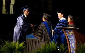 Graduate Haywood Hayes is congratulated by Rowan-Cabarrus Trustee Jeanne Dixon