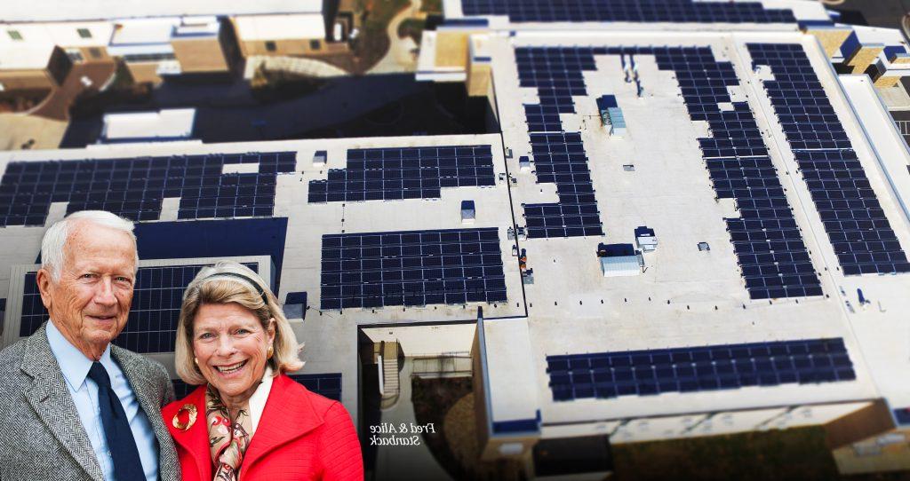 Aerial view of a Rowan-Cabarrus Community College with solar panels on the roof with an overlay of Fred & Alice Stanback smiling in the corner.